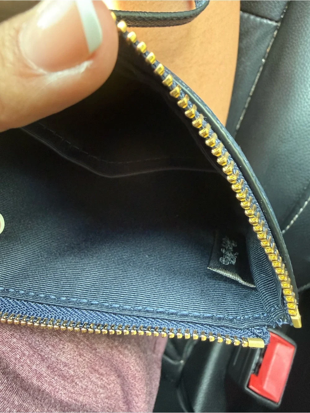 COACH Navy Pebbled Leather Wristlet with Gold Logo